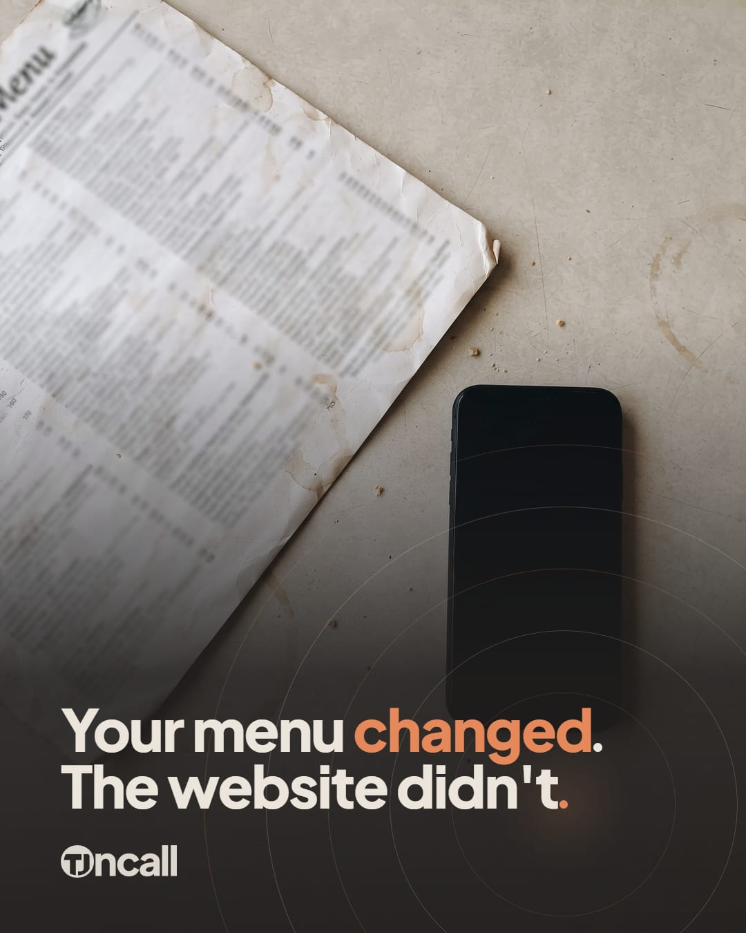 Generated prop photo for: Shoot a menu and phone, with the post's hook set over it in the brand type on a charcoal wash, carrying the brand signature: the hook's final period set as the glowing Signal dot with arcs radiating from it, and one word of the hook in Signal